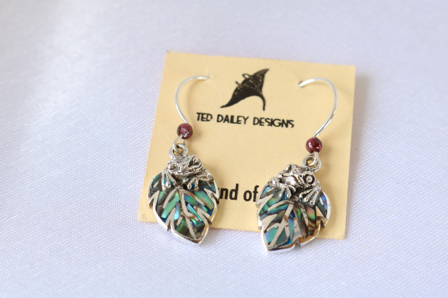 Frog on a leaf pendant earrings. Silver, abalone shell, garnets.