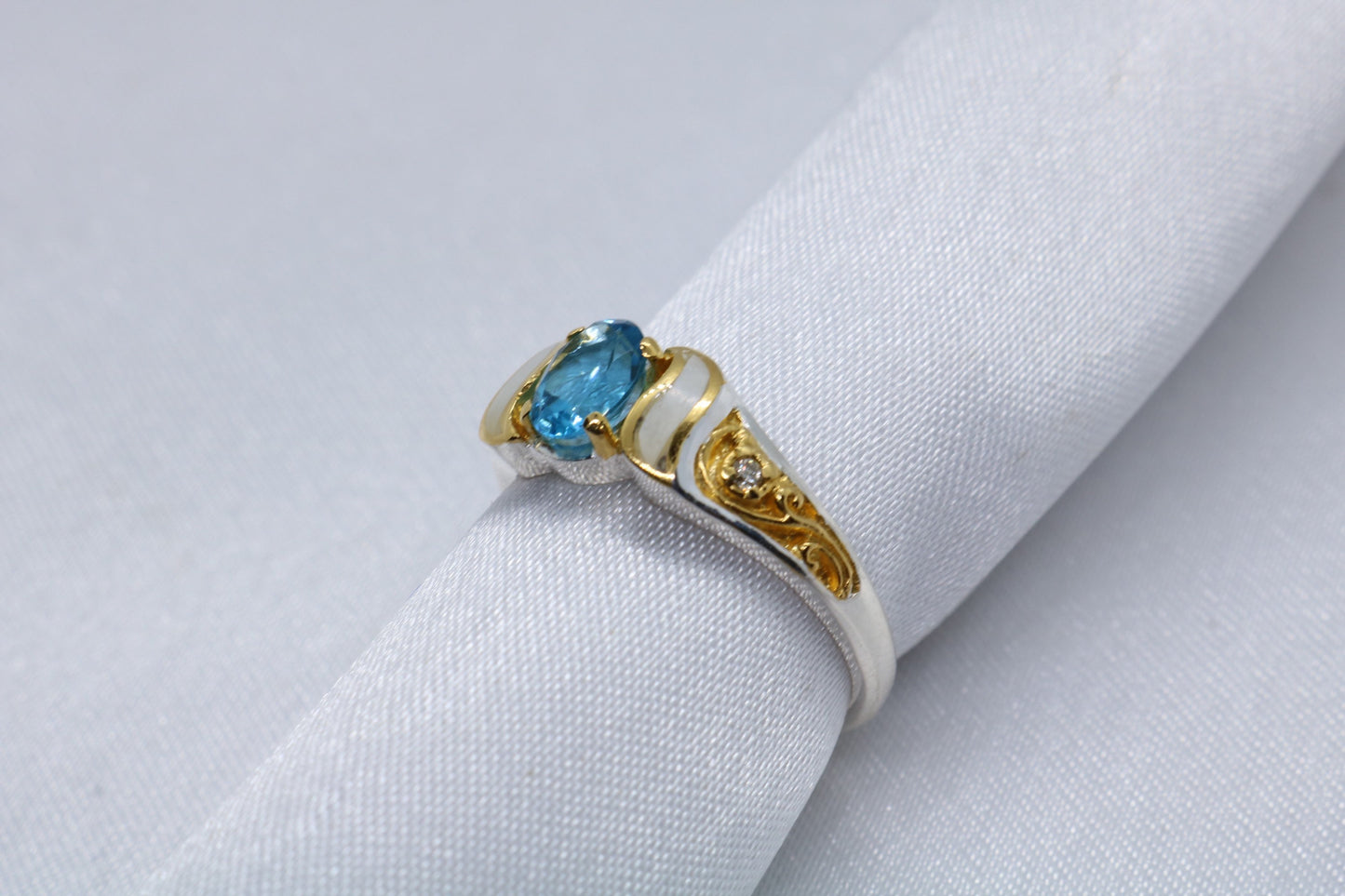 Swiss blue topaz ring, 2 x 1.5mm diamonds, mother of pearl, 18k gold, silver.