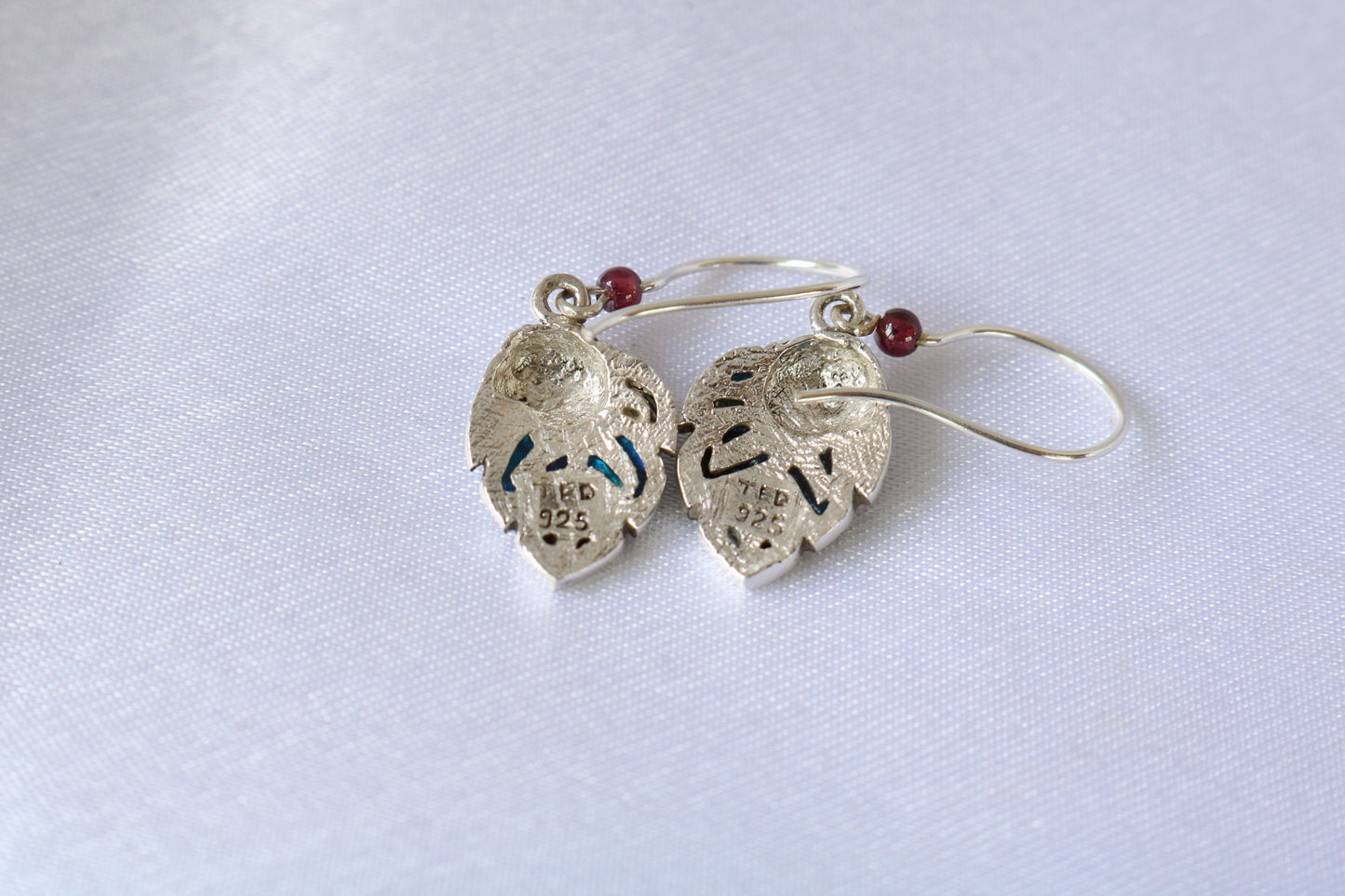 Frog on a leaf pendant earrings. Silver, abalone shell, garnets.