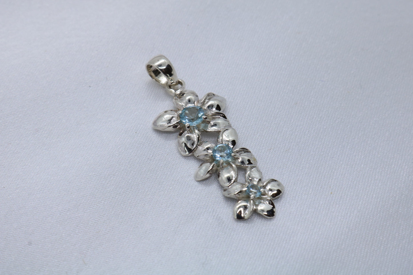 Plumeria triple flowers pendant. Silver, peridot, or blue topaz.