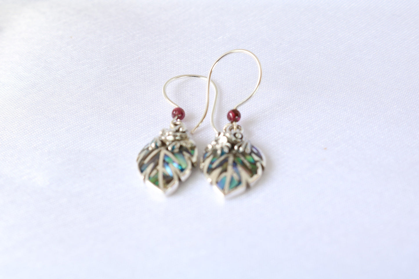 Frog on a leaf pendant earrings. Silver, abalone shell, garnets.