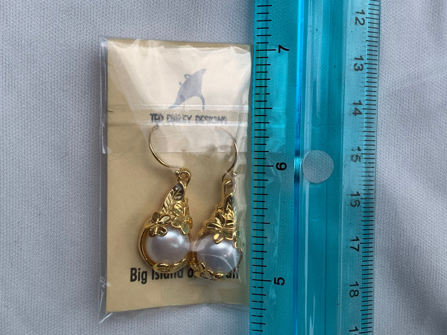 18k gold vermeil white mabe pearl plumeria flower earrings.