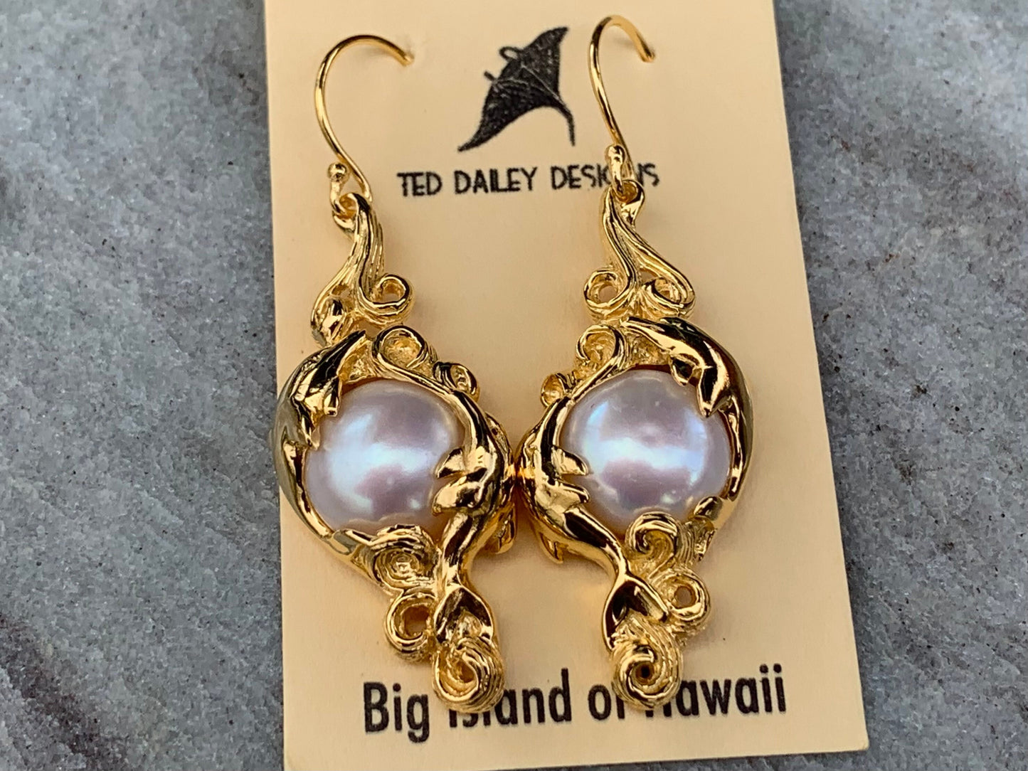 18k gold vermeil white mabe pearl dolphin earrings.