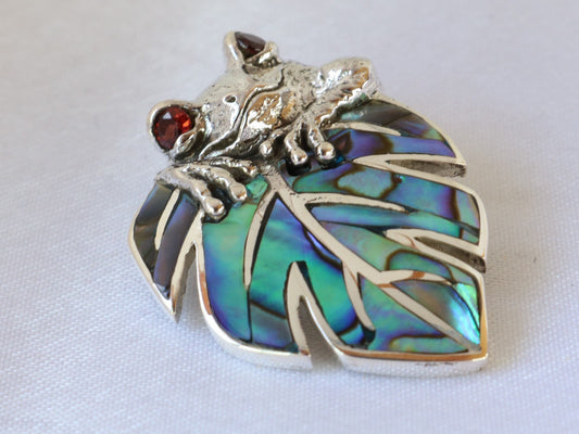 Frog on a leaf pendant necklace. Silver, abalone shell and garnet eyes.