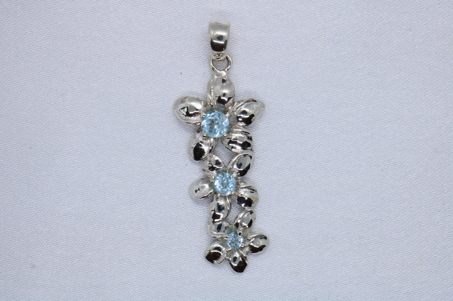 Plumeria triple flowers pendant. Silver, peridot, or blue topaz.