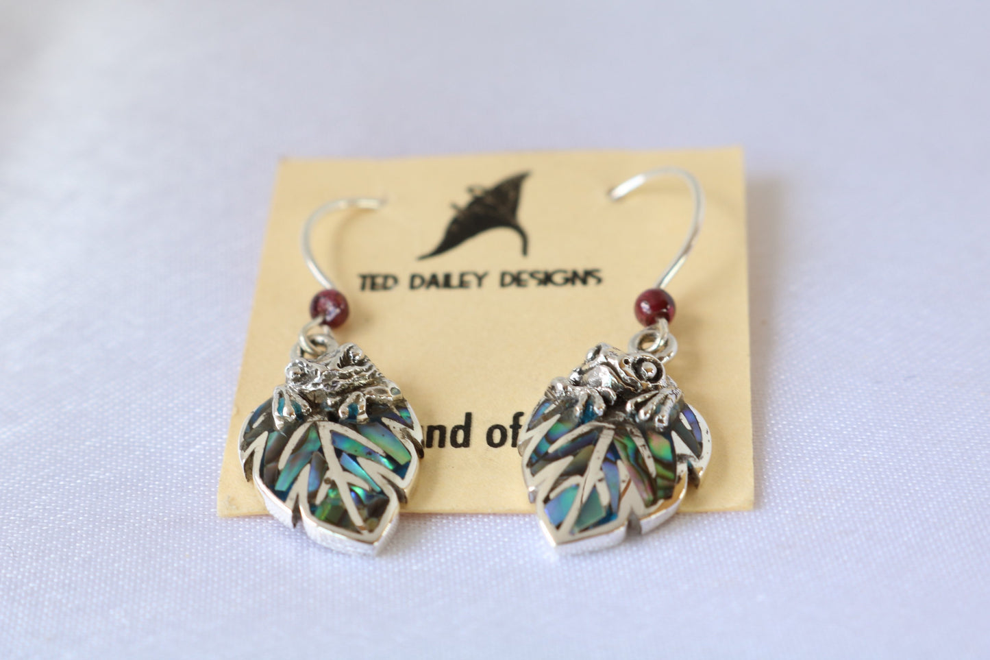 Frog on a leaf pendant earrings. Silver, abalone shell, garnets.