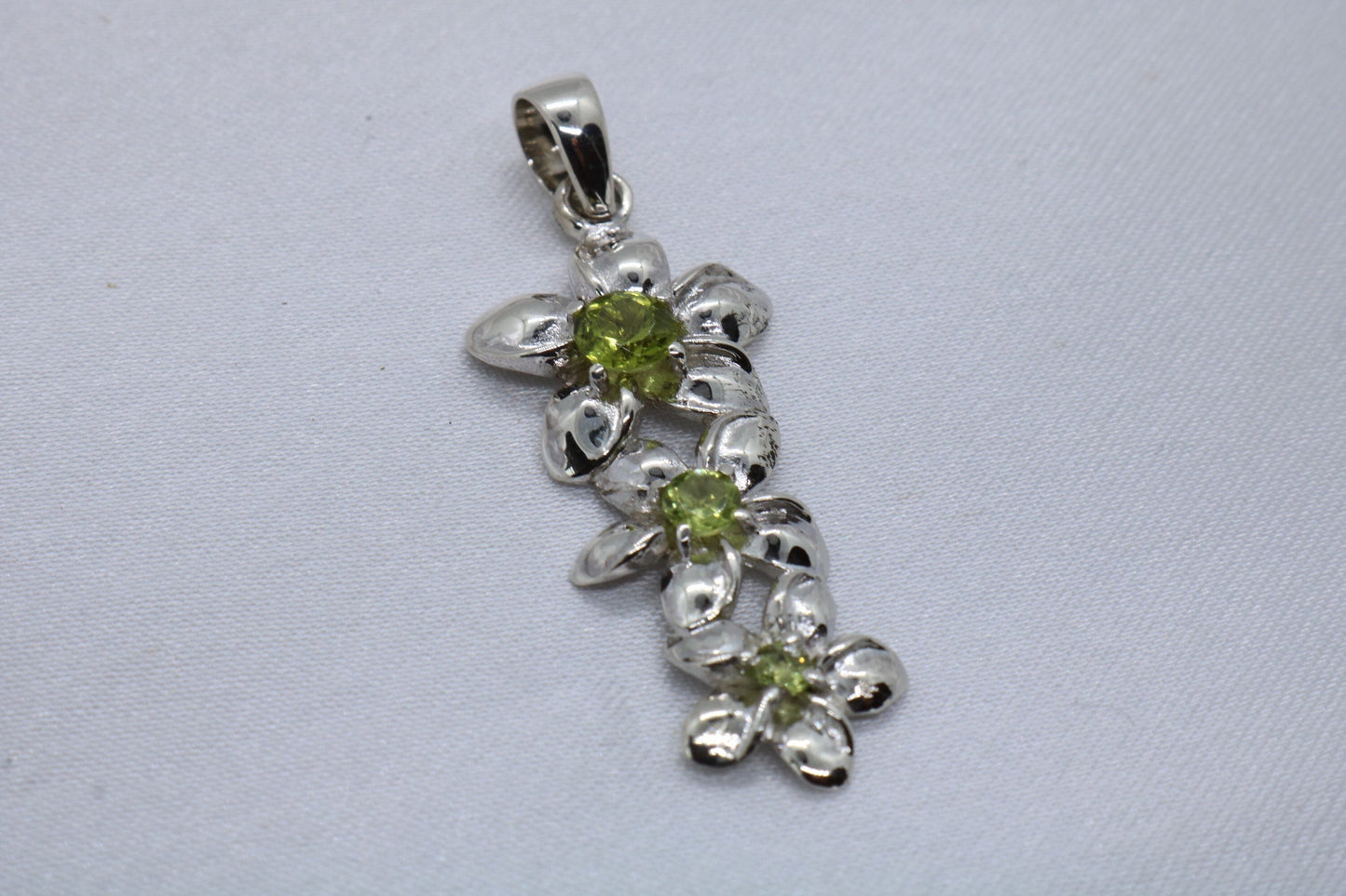 Plumeria triple flowers pendant. Silver, peridot, or blue topaz.