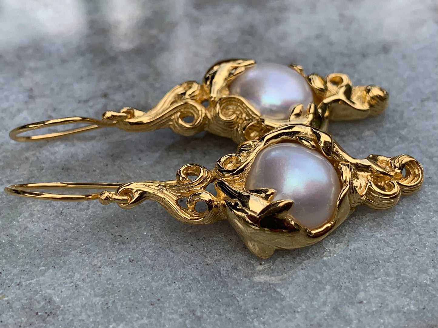 18k gold vermeil white mabe pearl dolphin earrings.