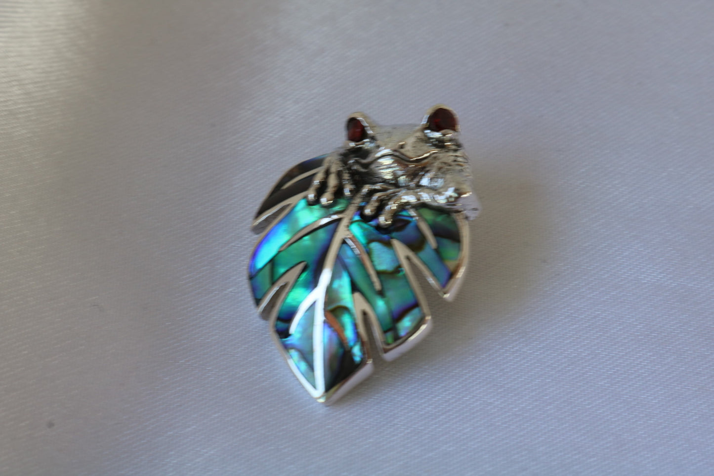Frog on a leaf pendant necklace. Silver, abalone shell and garnet eyes.