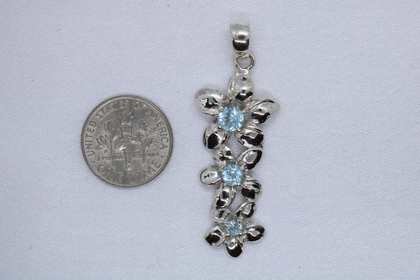 Plumeria triple flowers pendant. Silver, peridot, or blue topaz.