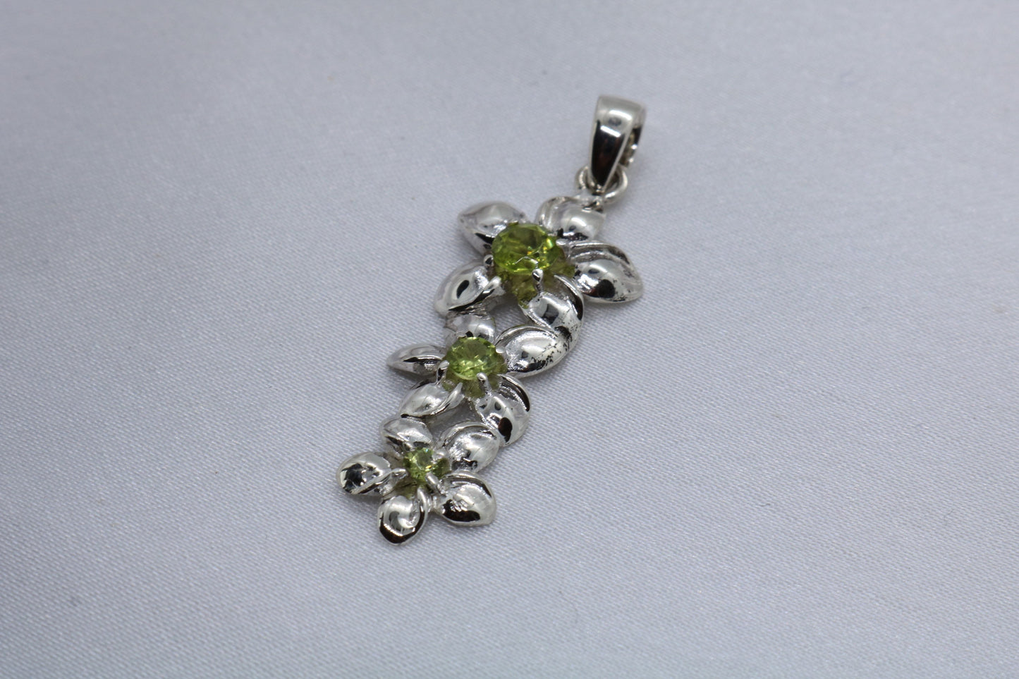 Plumeria triple flowers pendant. Silver, peridot, or blue topaz.