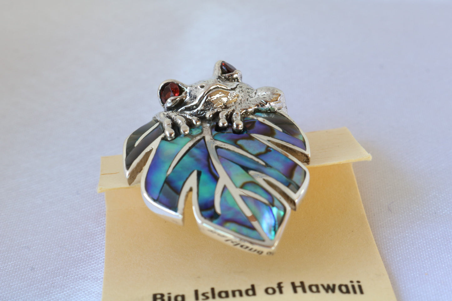 Frog on a leaf pendant necklace. Silver, abalone shell and garnet eyes.