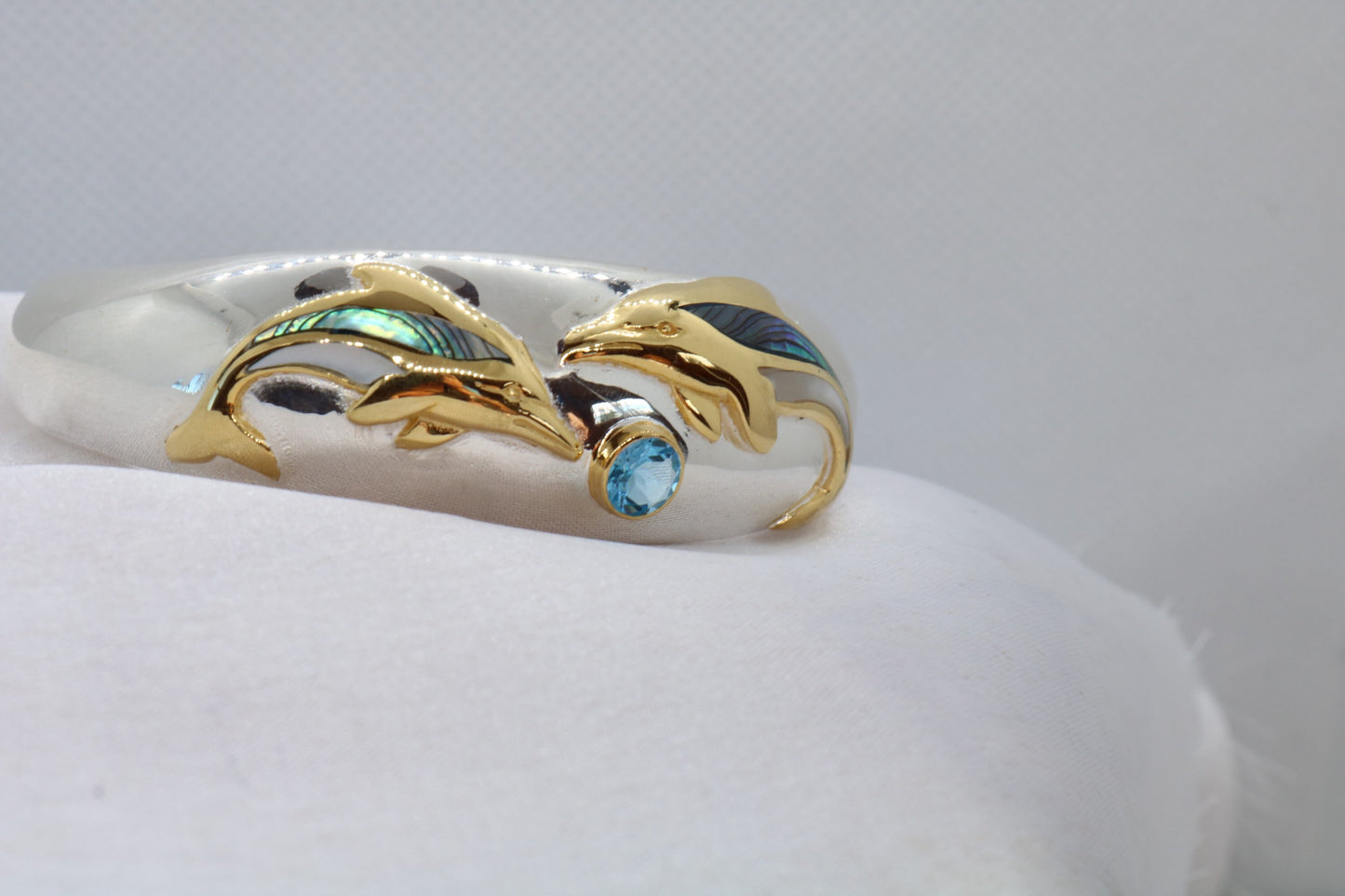 Aumakua dolphin Naia topaz cuff bracelet. Abalone shell, gold, silver.