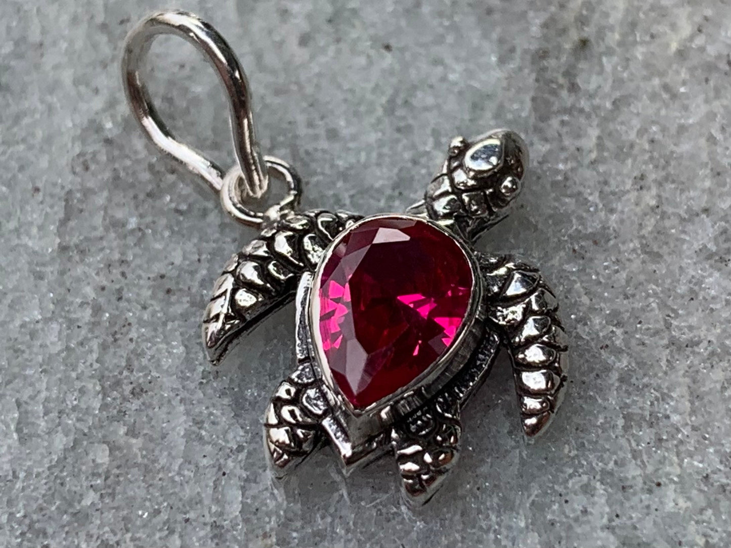 Ruby turtle charm pendant necklace. Sterling silver.