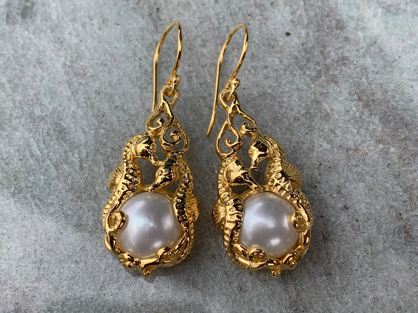 18k gold vermeil white mabe pearl seahorse earrings.