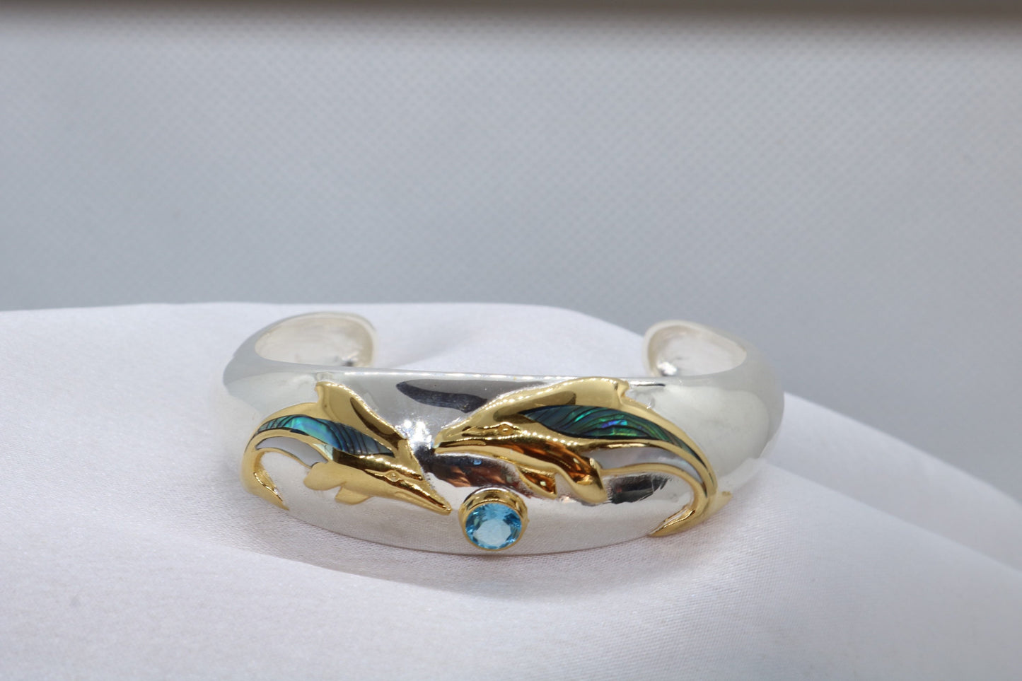 Aumakua dolphin Naia topaz cuff bracelet. Abalone shell, gold, silver.