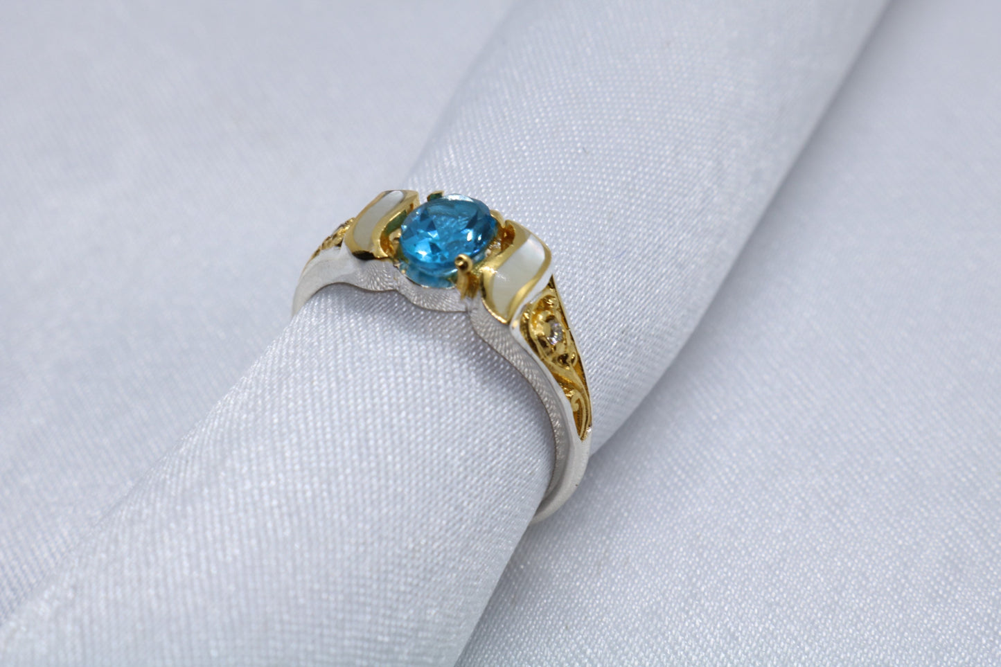 Swiss blue topaz ring, 2 x 1.5mm diamonds, mother of pearl, 18k gold, silver.