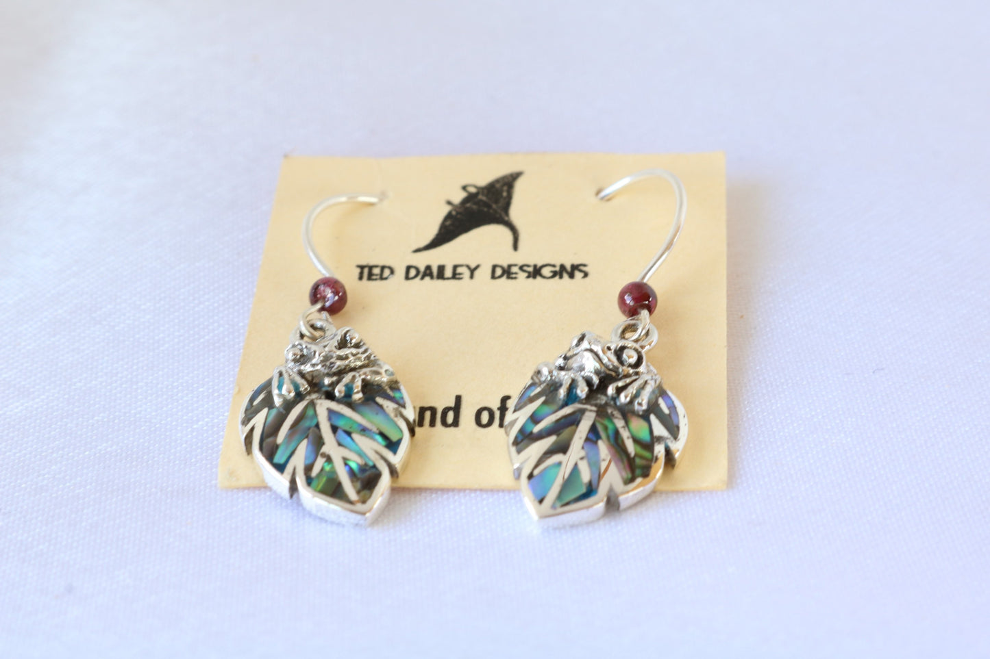 Frog on a leaf pendant earrings. Silver, abalone shell, garnets.