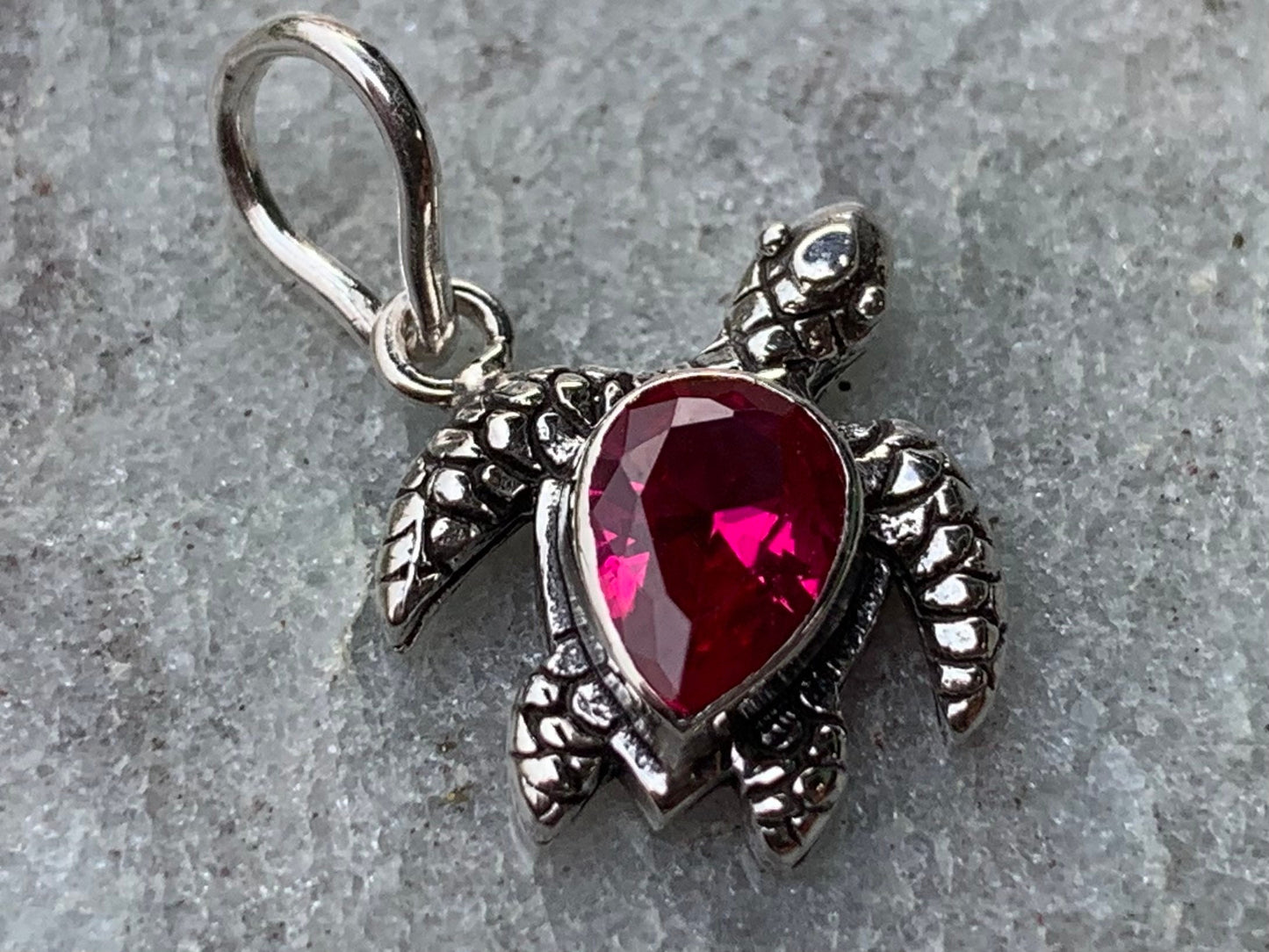 Ruby turtle charm pendant necklace. Sterling silver.