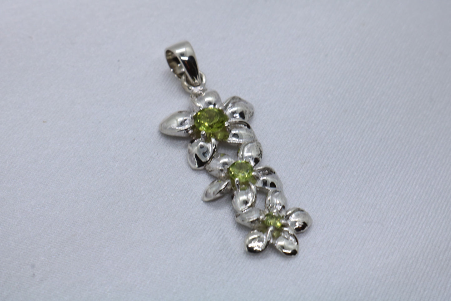 Plumeria triple flowers pendant. Silver, peridot, or blue topaz.