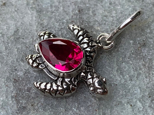 Ruby turtle charm pendant necklace. Sterling silver.