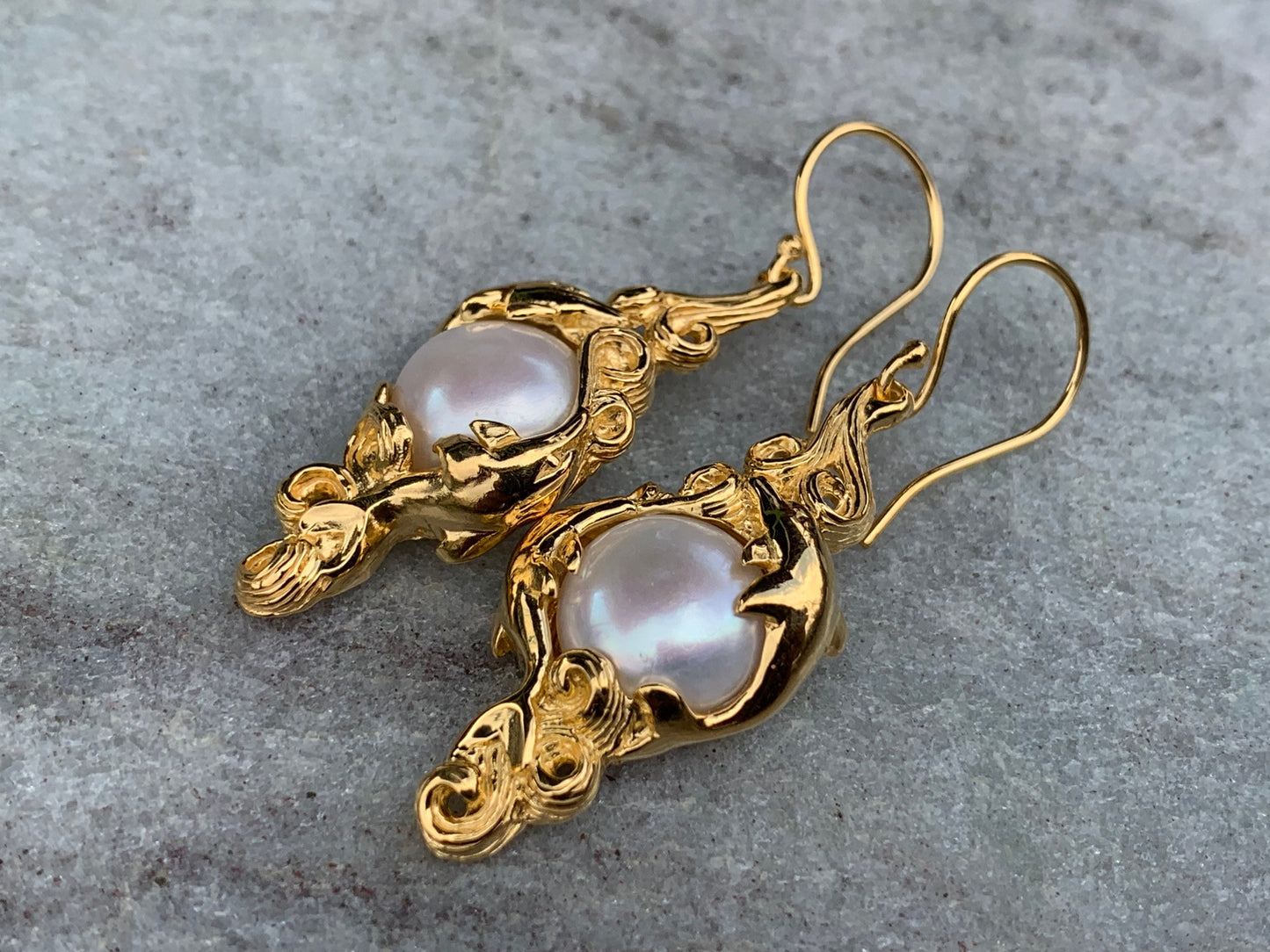 18k gold vermeil white mabe pearl dolphin earrings.