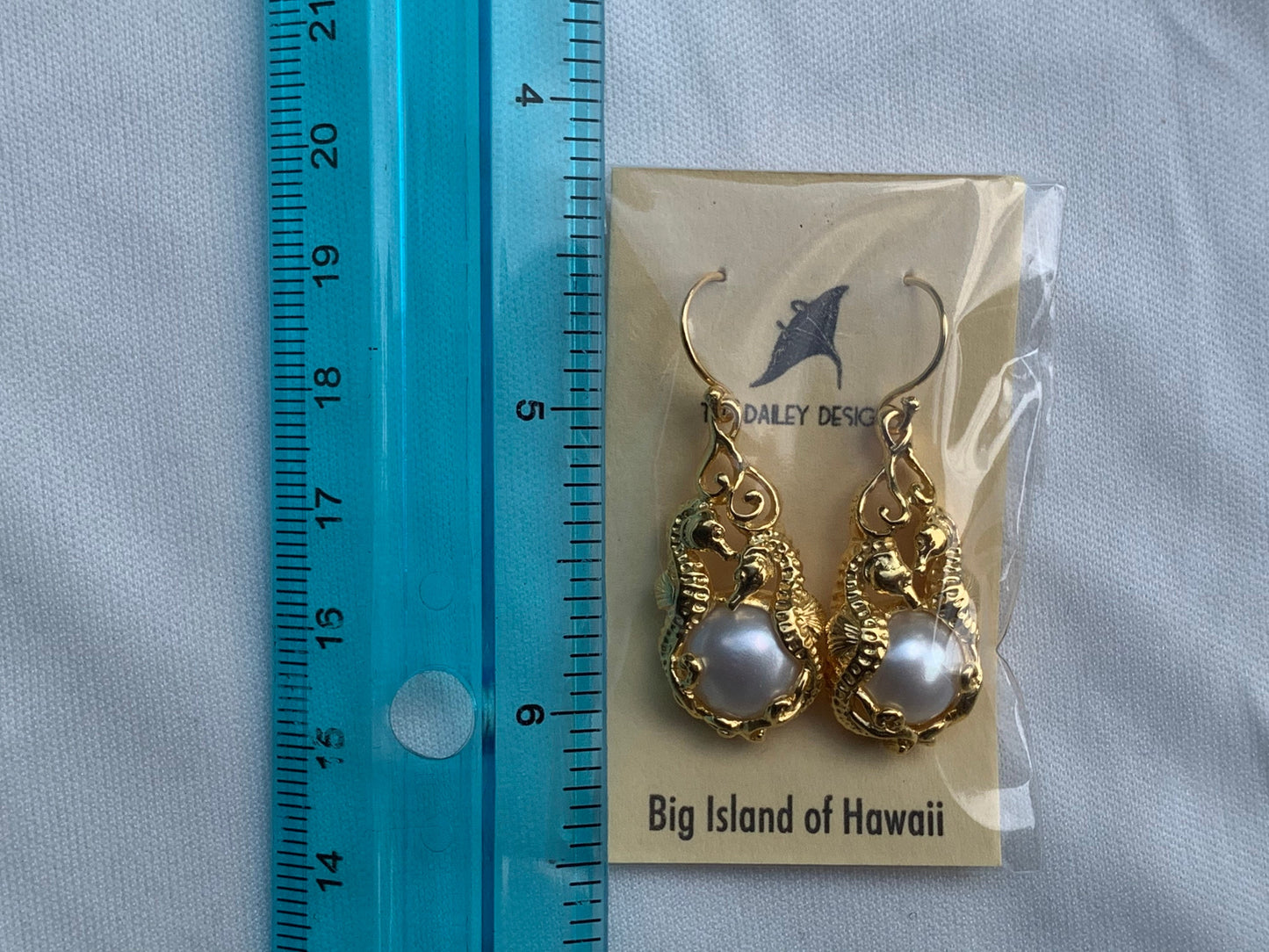 18k gold vermeil white mabe pearl seahorse earrings.