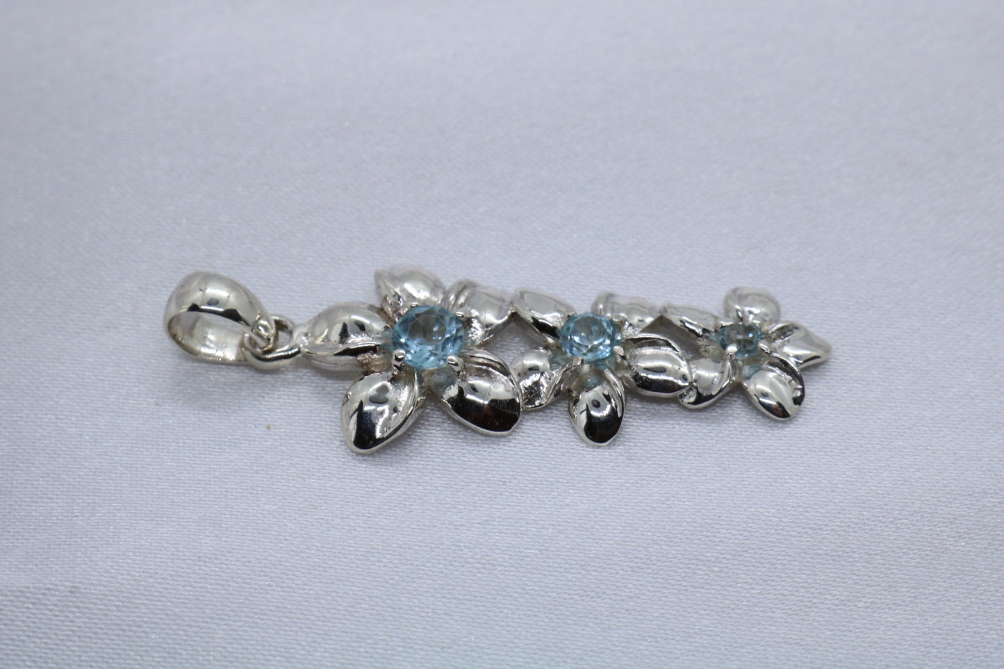 Plumeria triple flowers pendant. Silver, peridot, or blue topaz.