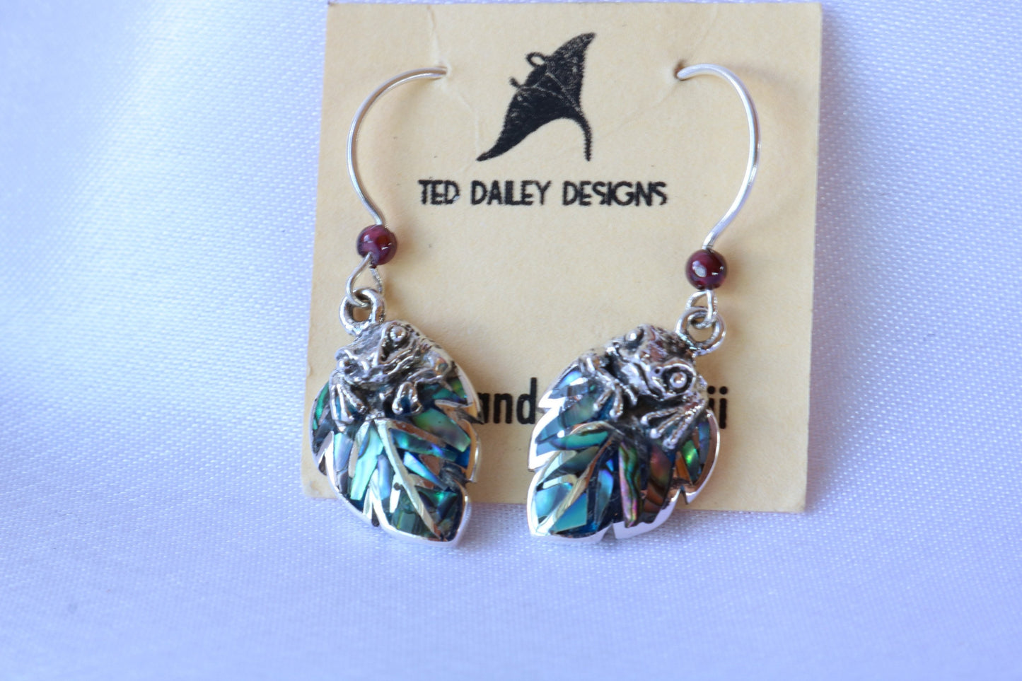 Frog on a leaf pendant earrings. Silver, abalone shell, garnets.