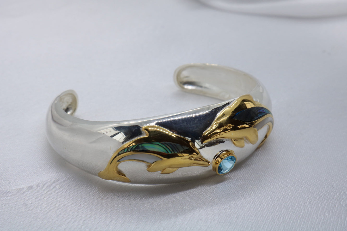 Aumakua dolphin Naia topaz cuff bracelet. Abalone shell, gold, silver.