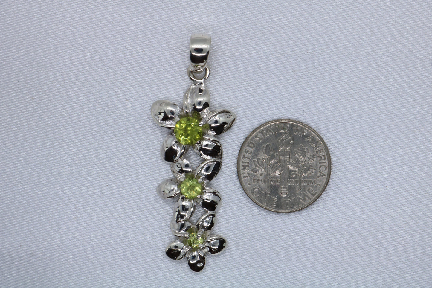 Plumeria triple flowers pendant. Silver, peridot, or blue topaz.