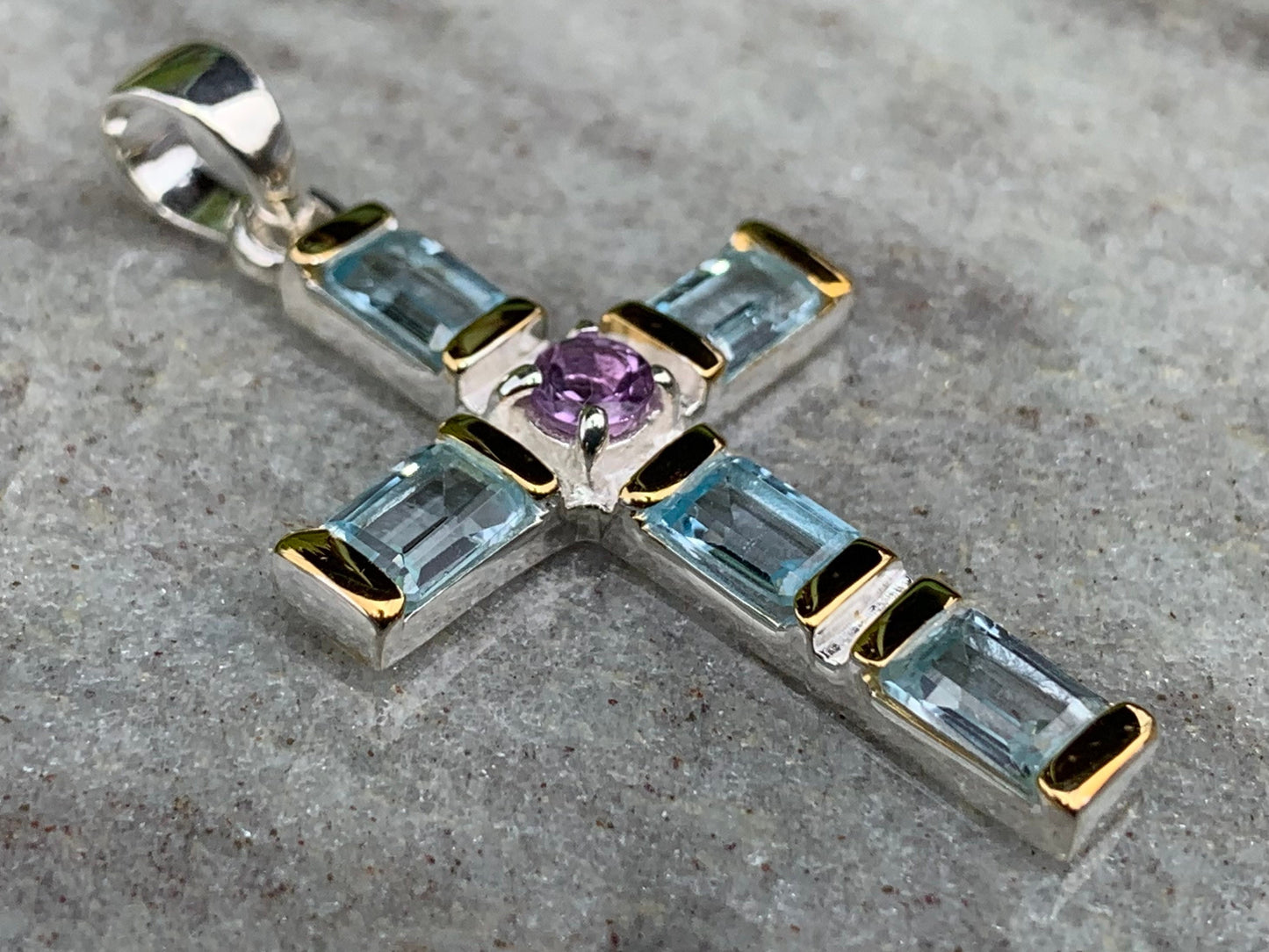 Cross Pendant Necklace. Blue topaz and Amethyst (in the middle). Sterling Silver, 18k gold.