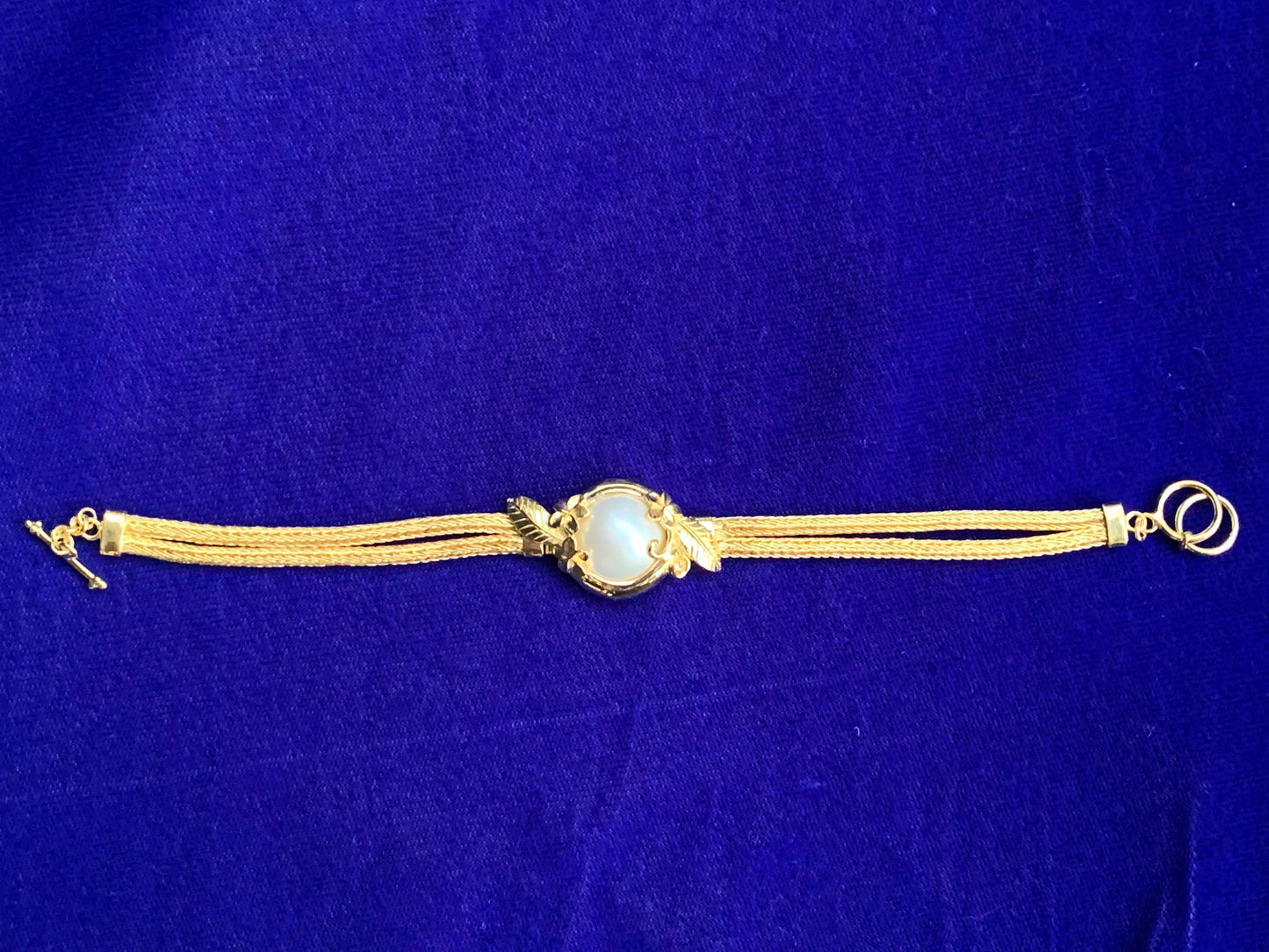 18K Gold Vermeil Plumeria Flower Bracelet. White Mabe Pearl.