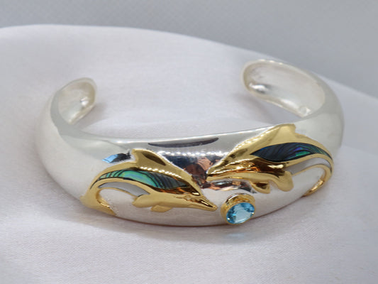 Aumakua dolphin Naia topaz cuff bracelet. Abalone shell, gold, silver.