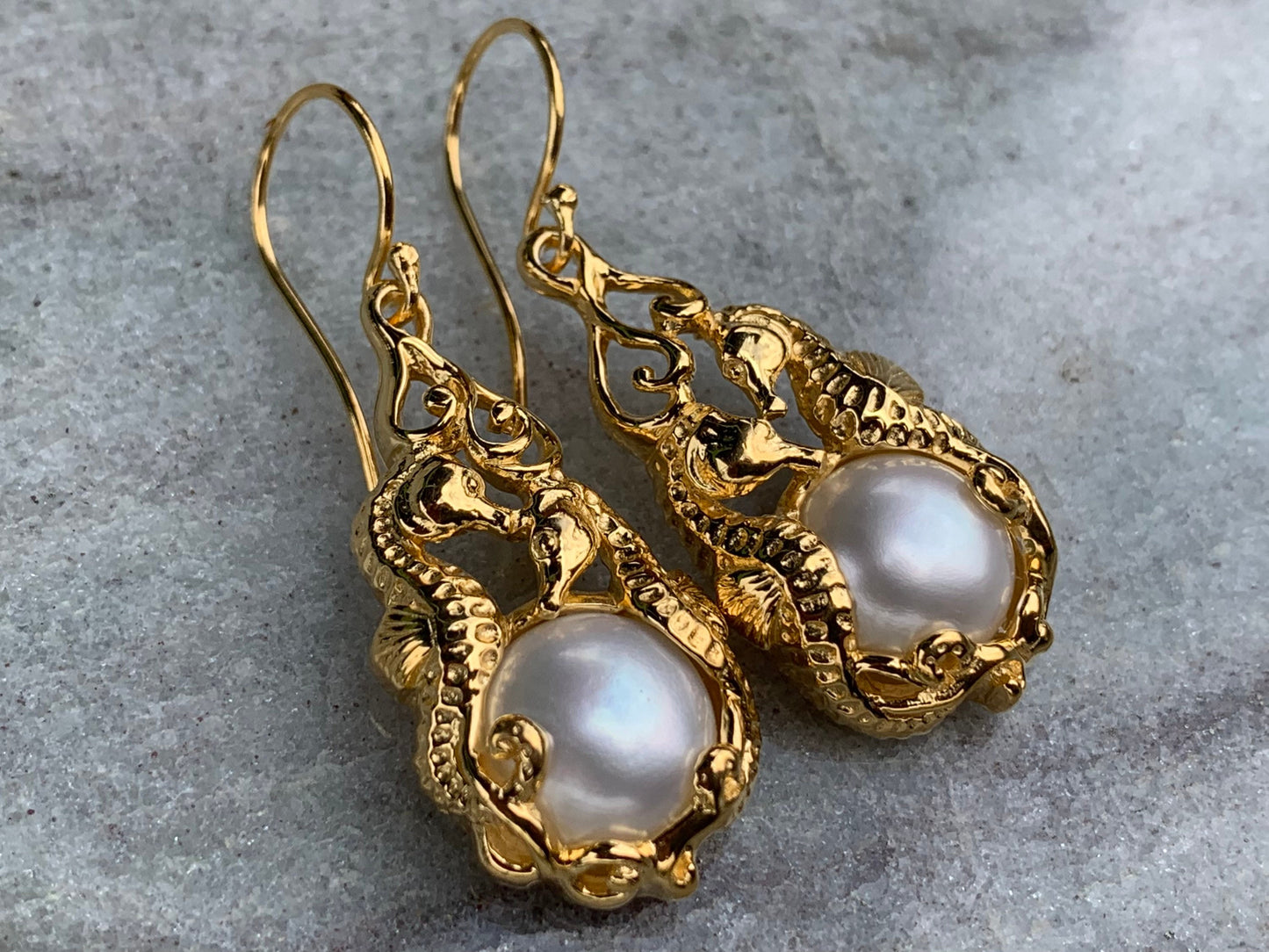 18k gold vermeil white mabe pearl seahorse earrings.