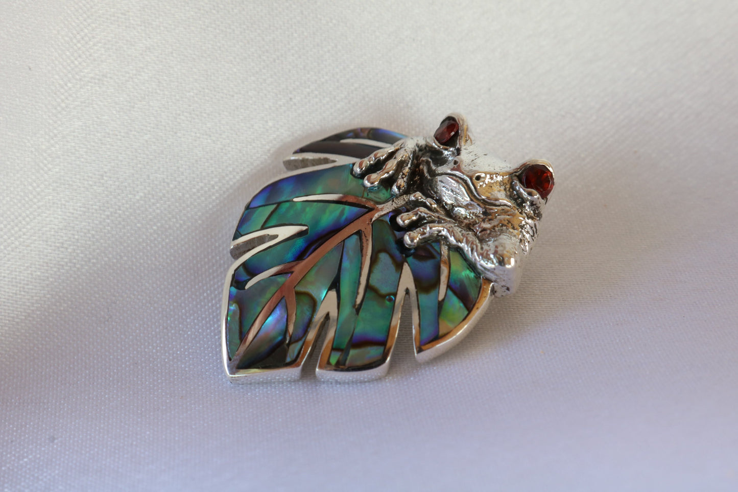 Frog on a leaf pendant necklace. Silver, abalone shell and garnet eyes.